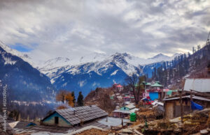 Manali and Solang Valley covered in thick snow with tourists enjoying snowfall and winter activities.